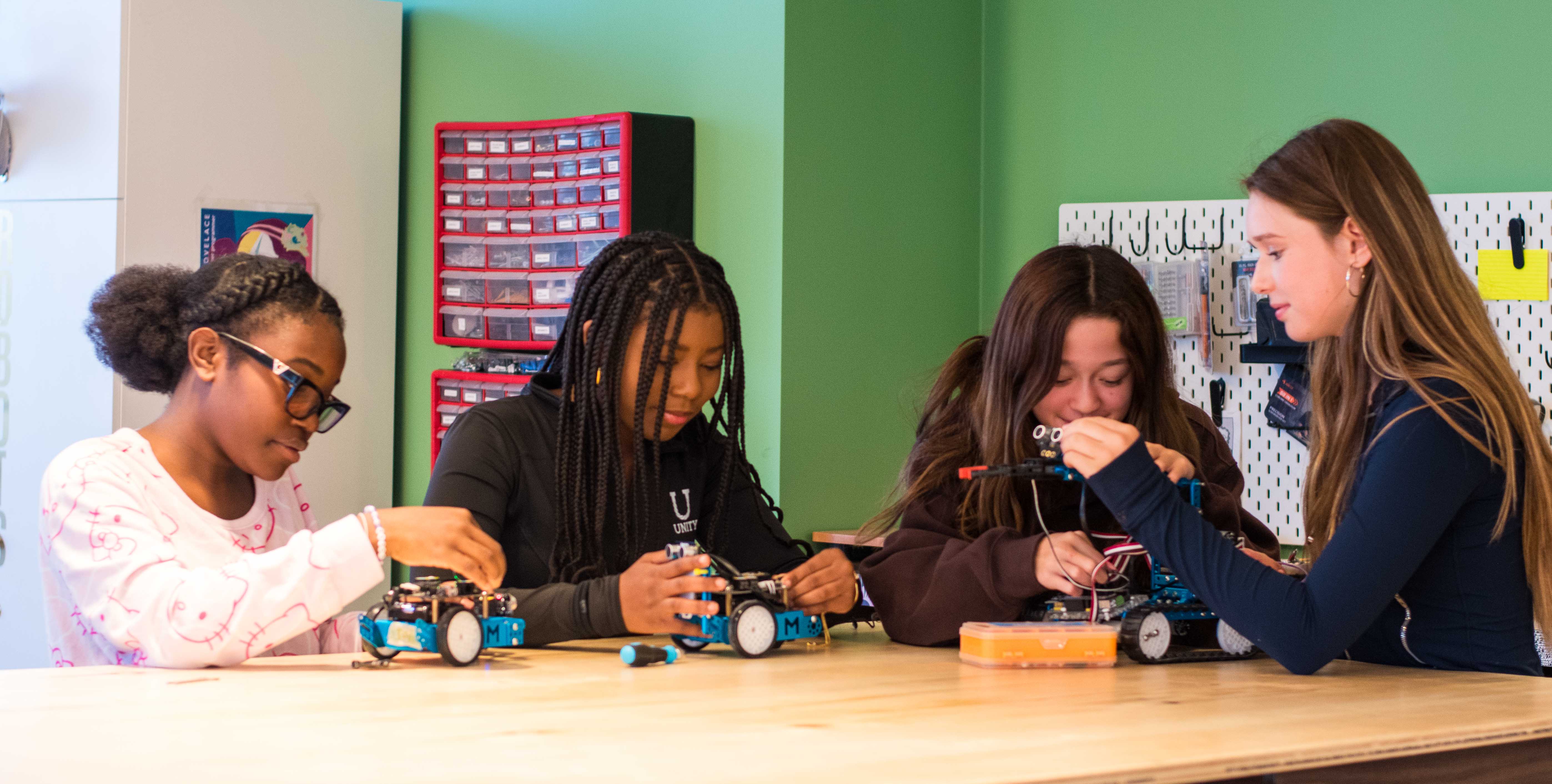 Students in the CERES lab making robots.